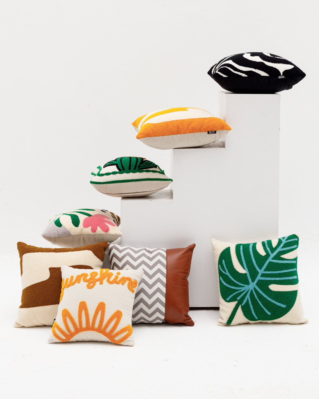 Coussin à motif de feuilles