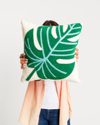 Coussin à motif de feuilles
