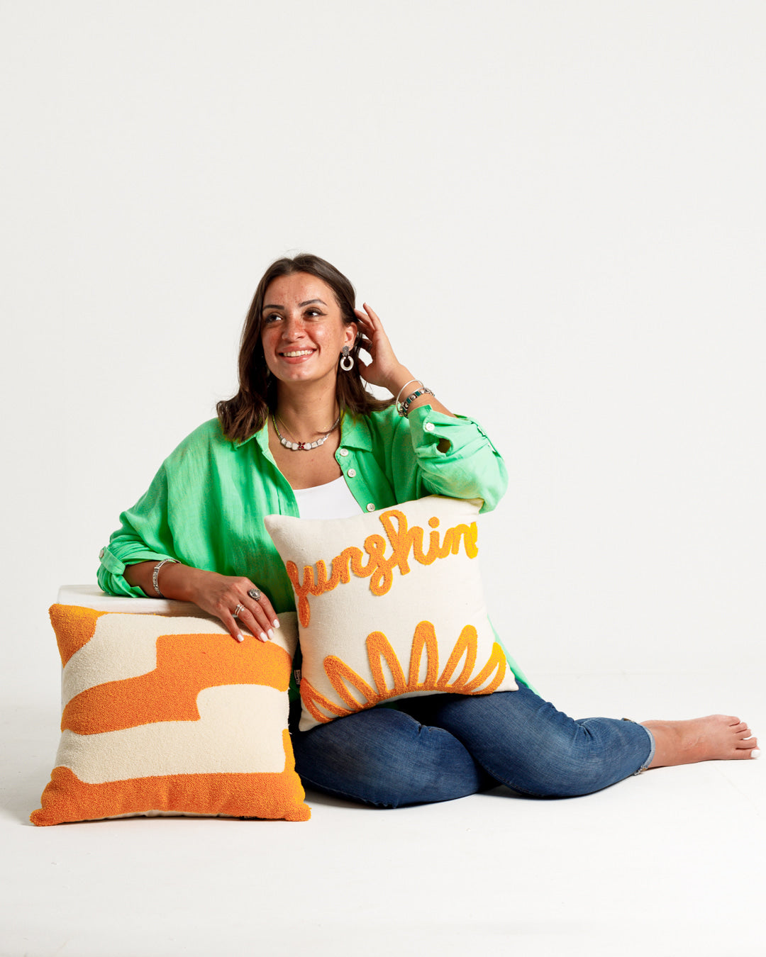 Coussin capitonné jaune pailleté