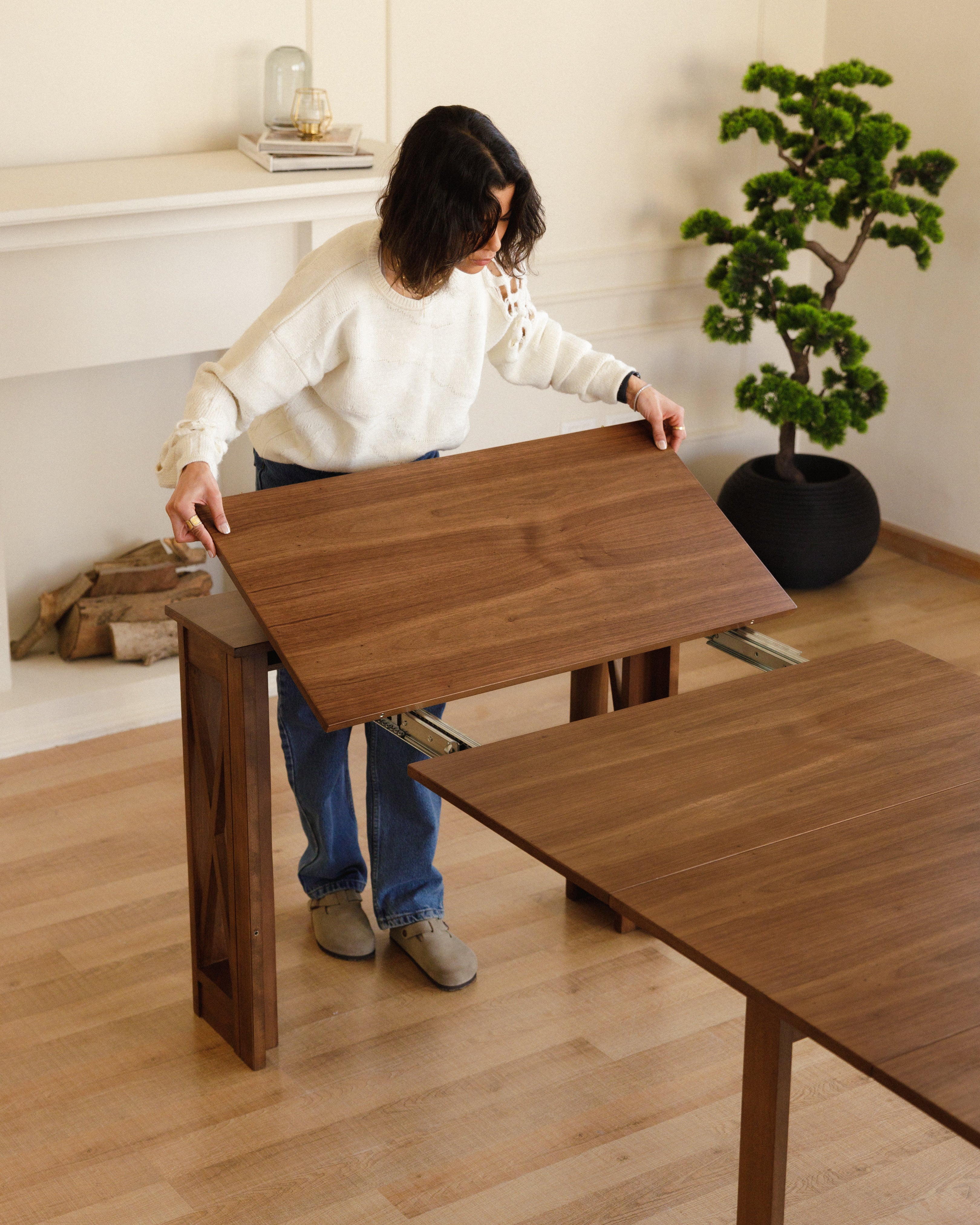 Table transformable en noyer