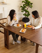 Table transformable en noyer